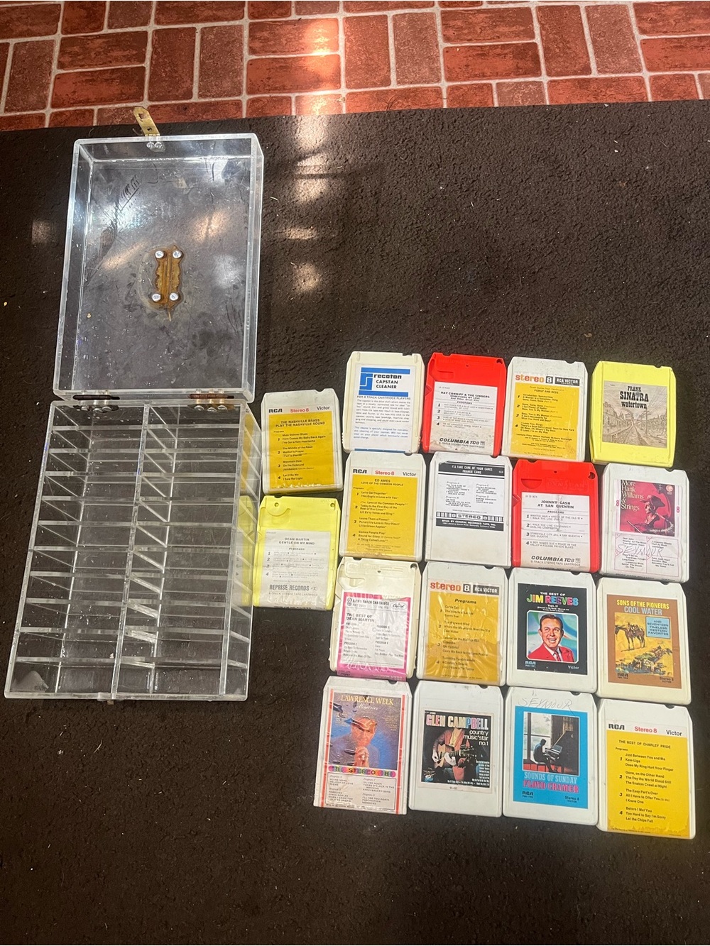 Vintage 8-Track Tape Storage Case with Mixed Color Cartridges